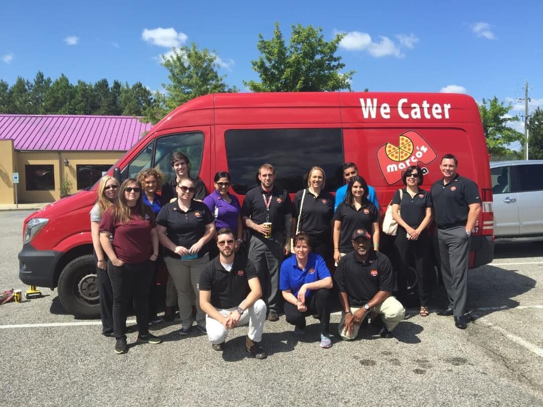 Jason Lowder's field team walking into a neighboring business